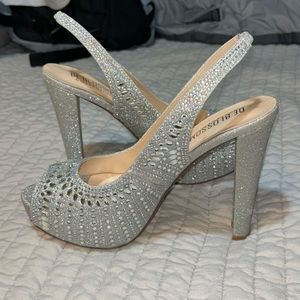 Size 8 DeBlossom silver pumps
